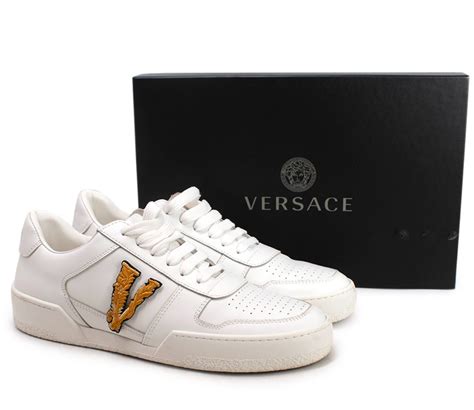 Versace: White Ilus Sneakers 